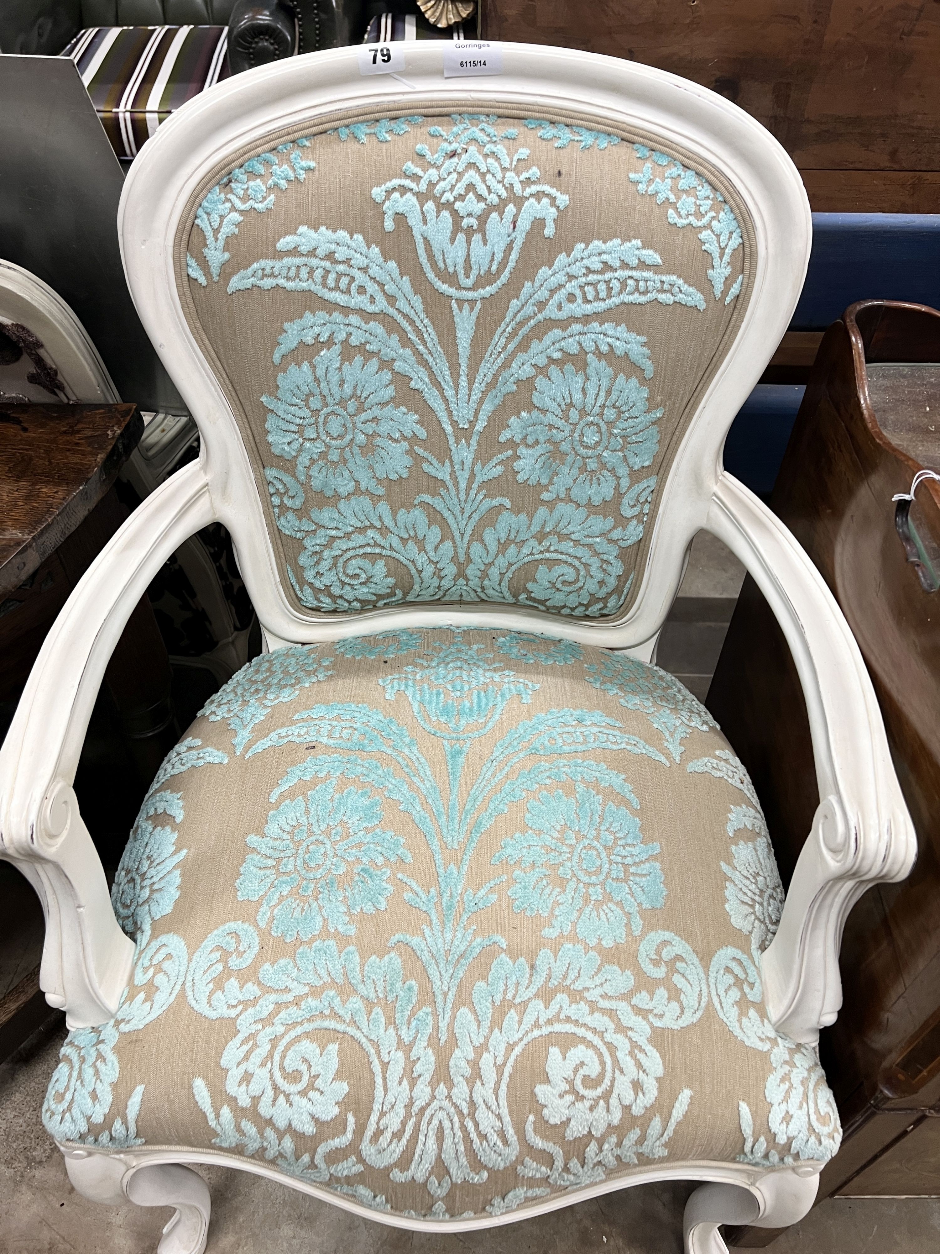 A French style painted upholstered open armchair, width 54cm, depth 50cm, height 95cm